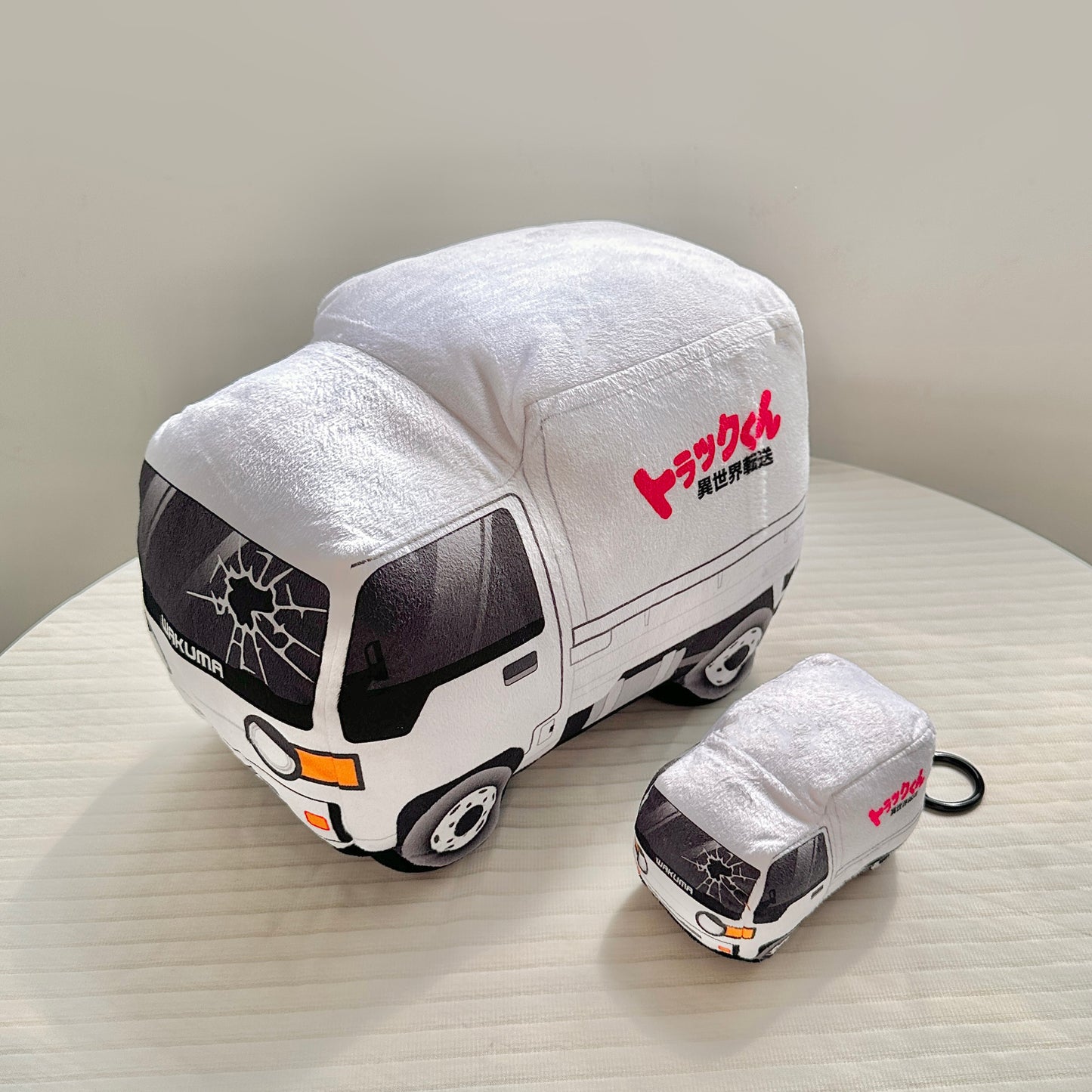 Truck-kun plushie by Wakuma – anime-inspired truck-shaped isekai plush, soft premium fabric, available in 30cm and 15cm sizes.