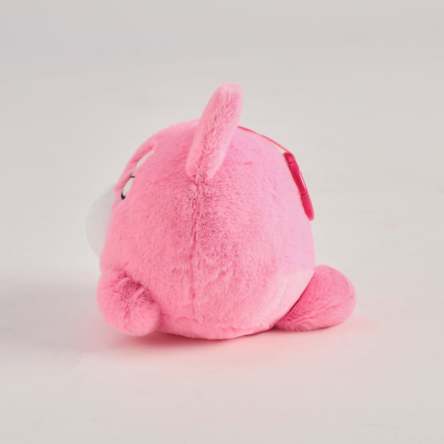Pink round Wakuma bear plush keychain with chibi-style face, two forehead marks, and small paws.